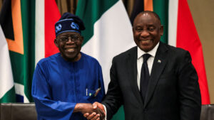 South African President Cyril Ramaphosa shakes hands with Nigerian President Bola Tinubu on the day of the 11th Bi-National Commission between the two countries at Tuynhuys, in Cape Town, South Africa, December 3, 2024.REUTERS/Esa Alexander | TPX IMAGES OF THE DAY