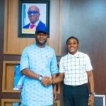 Deputy Governor of Edo State, Dennis Idahosa, and Master Daniel Osagiobare.
