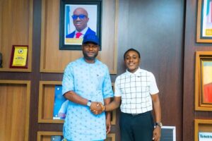 Deputy Governor of Edo State, Dennis Idahosa, and Master Daniel Osagiobare.