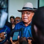 Akwa Ibom Governor Umo Eno addressing the media at Victor Attah’s Int’l Airport shortly on his arrival from international engagements