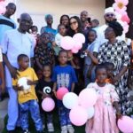 Nadia Zakaria (C) at the orphanage