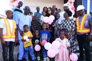 Nadia Zakaria (C) at the orphanage