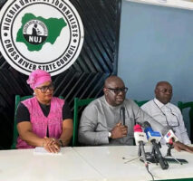 Pastor Cobham, flanked by the NUJ chairman and the permanent secretary information ministry
