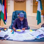 President-Tinubu-signns