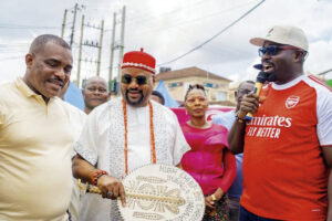 Representative of Gov. Solido, Okey Ezeobi, Chief Christopher Ndubisi, and Mayor of Awka South, Prince Chinedu Okafor, during the road inaguration