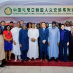 The Chinese Ambassador to Nigeria, Yu Dunhai (5th r front queue), the Director-General of the Nigerian Television Authority (NTA), Salihu Abdulhamid Dembos (m front queue) and other dignitaries who participated in the China-Nigeria Film and Literature Symposium and the Signing Ceremony of CMC-NTA Cooperation Agreement in Abuja.