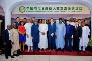 The Chinese Ambassador to Nigeria, Yu Dunhai (5th r front queue), the Director-General of the Nigerian Television Authority (NTA), Salihu Abdulhamid Dembos (m front queue) and other dignitaries who participated in the China-Nigeria Film and Literature Symposium and the Signing Ceremony of CMC-NTA Cooperation Agreement in Abuja.