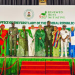L-R Wife of the Inspector General of Police, Mrs Mutiat Disu, IGP Tunji Disu, Representative of the Wife of the Chief of Army Staff, Mrs Safiyyah Shaibu, Chief of Army Staff, Lt. General Waidi Shaibu, Wife of the Senate President, Mrs Ekaette Akpabio, Wife of the Vice President, Hajia Nana Shettima, First Lady of Nigeria, Senator Oluremi Tinubu, Chief of Defence Staff, General Olufemi Oluyede, his wife, Mrs Mernan Oluyede, Chief of Naval Staff, Vice Admiral Idi Abass, his wife Mrs Aisha Abass, Chief of Air Staff, Air Vice Marshall Aneke and the Wife of the Chief of Staff to the President, Mrs Salamatu Gbajabiamila after the presentation of cheques from the Renewed Hope Initiative by the First Lady held at the State House Banquet Hall Abuja on Thursday 27th August 2026