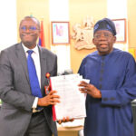 L-R:Chairman, Independent Corrupt Practices and other Related Offences Commission (ICPC), Dr. Musa  Aliyu, presenting transmittal interim investigation report on the purported Director General of Presidential Foreign Investment Promotion Council (PFIPC), Adeniyi Adeyemi Matthew, to the President Bola Ahmed Tinubu, held at Presidential Villa Abuja on Thursday