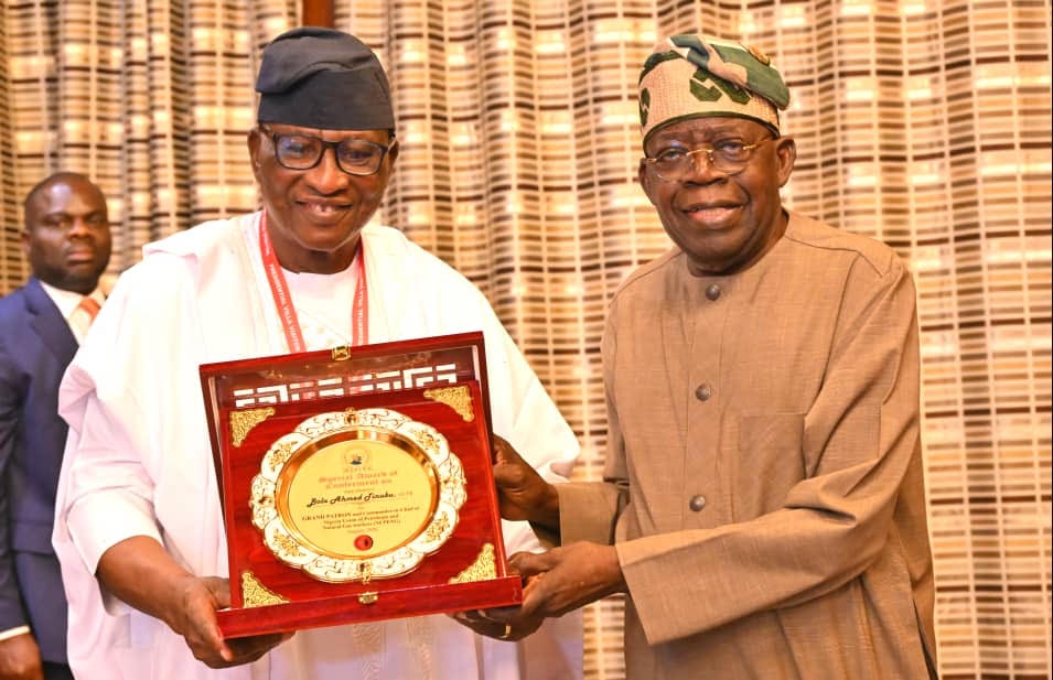 President Bola Tinubu receiving the conferment award of grant patron from National Executive President of Nigeria Union of Petroleum and Natural Gas workers, Comrade Salimon Oladiti at the presidential villa Abuja on Thursday, August 13, 2026
