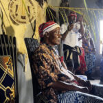 • Chief Apugo performing the new yam festival rites