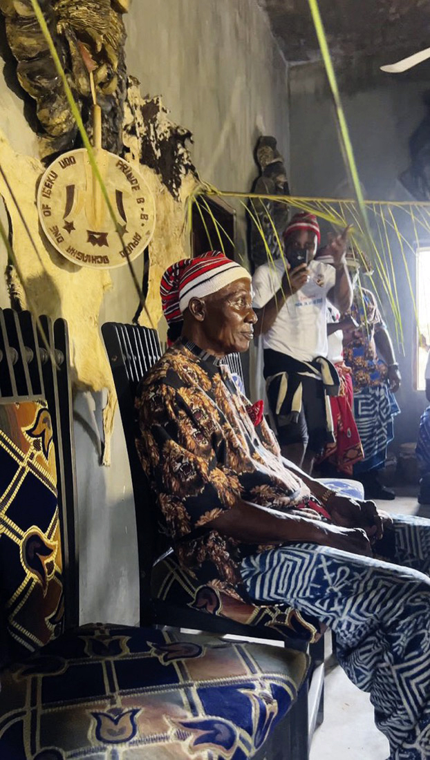 • Chief Apugo performing the new yam festival rites